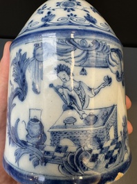 A Dutch Delft blue and white tea caddy with a pipe smoker, 18th C.