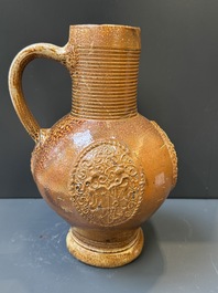 Two armorial stoneware jugs, Raeren, one dated 1586, 16/17th C.