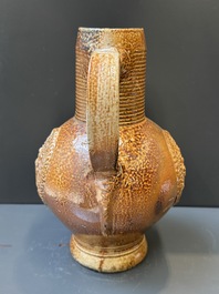 Two armorial stoneware jugs, Raeren, one dated 1586, 16/17th C.