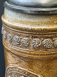 Two stoneware jugs with pewter lids, one with a coat of arms and dated 1636, Germany, 17th C.