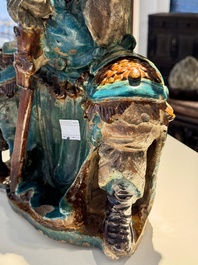 An impressive and fine Chinese sancai-glazed biscuit Guandi, Ming, 17th C.