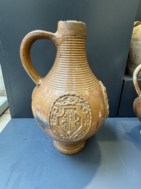 Two armorial stoneware jugs, Raeren, one dated 1586, 16/17th C.