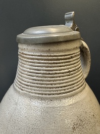 Two stoneware jugs with pewter lids, one with a coat of arms and dated 1636, Germany, 17th C.