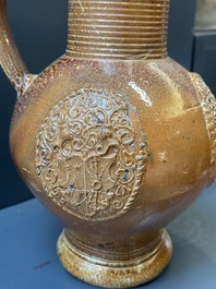 Two armorial stoneware jugs, Raeren, one dated 1586, 16/17th C.