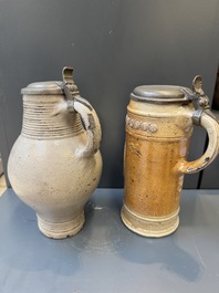 Two stoneware jugs with pewter lids, one with a coat of arms and dated 1636, Germany, 17th C.