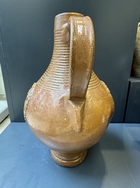 Two armorial stoneware jugs, Raeren, one dated 1586, 16/17th C.