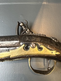 Three impressive flintlock muskets or 'moukahlas', two percussion pistols and three gunpowder horns, Morocco, 18/19th C.