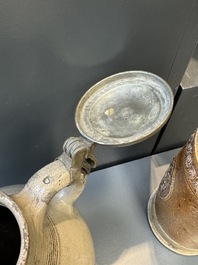 Two stoneware jugs with pewter lids, one with a coat of arms and dated 1636, Germany, 17th C.