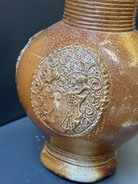Two armorial stoneware jugs, Raeren, one dated 1586, 16/17th C.