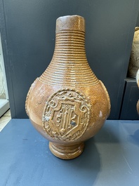 Two armorial stoneware jugs, Raeren, one dated 1586, 16/17th C.