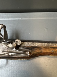 Three impressive flintlock muskets or 'moukahlas', two percussion pistols and three gunpowder horns, Morocco, 18/19th C.