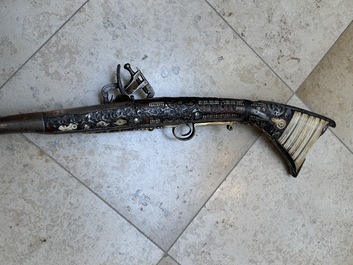 Three impressive flintlock muskets or 'moukahlas', two percussion pistols and three gunpowder horns, Morocco, 18/19th C.