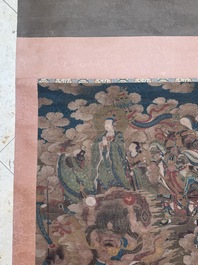 Chinese school: 'A sky full of Buddhist divinities', ink and colour on silk, 18th C.