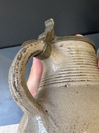 Two stoneware jugs with pewter lids, one with a coat of arms and dated 1636, Germany, 17th C.