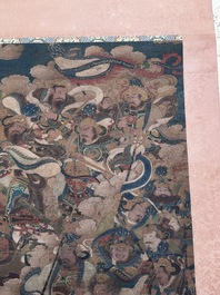 Chinese school: 'A sky full of Buddhist divinities', ink and colour on silk, 18th C.