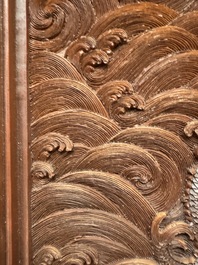 A rectangular Chinese carved red lacquer 'dragon' table screen, later wooden stand, Qianlong