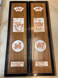 A Chinese four-part folding screen with iron-red-decorated porcelain plaques, 19/20th C.