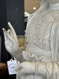 A large Chinese Dehua blanc de Chine Guanyin, He Chaozong and Xuande mark, Republic