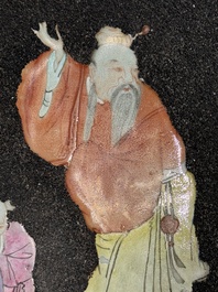 A pair of Chinese famille rose black-gravel-ground plaques, Jiaqing