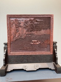 A rectangular Chinese carved red lacquer 'dragon' table screen, later wooden stand, Qianlong
