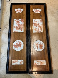 A Chinese four-part folding screen with iron-red-decorated porcelain plaques, 19/20th C.