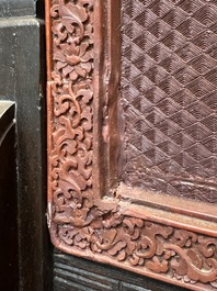 A rectangular Chinese carved red lacquer 'dragon' table screen, later wooden stand, Qianlong