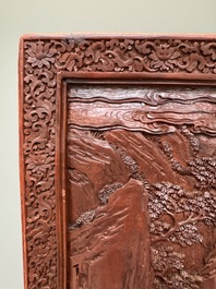 A rectangular Chinese carved red lacquer 'dragon' table screen, later wooden stand, Qianlong