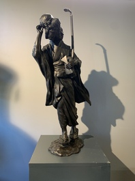 A large Japanese bronze okimono of a musician, Shinpūsei 森風聲作 mark, Meiji, 19th C.