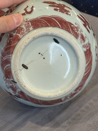 A Chinese copper-red and white 'dragon' bottle vase, 18th C.