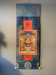 A Tibetan thangka depicting a lama, 19th C.