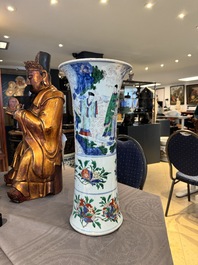 A Chinese wucai 'gu' vase with narrative design, Transitional period