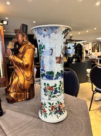 A Chinese wucai 'gu' vase with narrative design, Transitional period