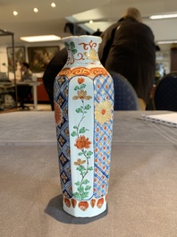 Two polychrome Dutch Delft petit feu vases with floral design, early 18th C.