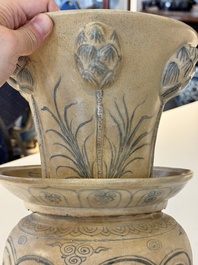 A rare Vietnamese or Annamese reticulated blue and white lotus vessel, 15/16th C.