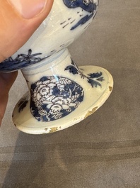 A Dutch Delft blue, white and manganese pear-shaped chinoiserie vase, late 17th C.