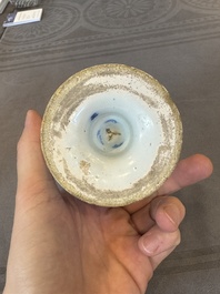 A Dutch Delft blue, white and manganese pear-shaped chinoiserie vase, late 17th C.