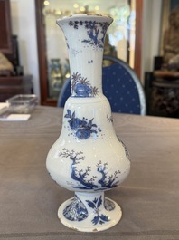 A Dutch Delft blue, white and manganese pear-shaped chinoiserie vase, late 17th C.