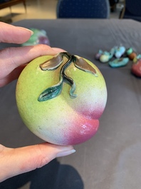 A collection of 12 Chinese famille rose fruit models, including a peach-shaped box and cover, 19th C.