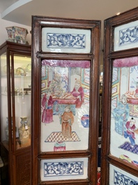 A Chinese four-part folding screen with famille rose plaques, 19th C.