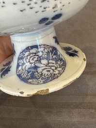 A Dutch Delft blue, white and manganese pear-shaped chinoiserie vase, late 17th C.