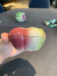 A collection of 12 Chinese famille rose fruit models, including a peach-shaped box and cover, 19th C.