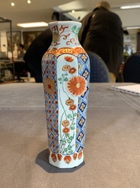 Two polychrome Dutch Delft petit feu vases with floral design, early 18th C.