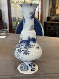 A Dutch Delft blue, white and manganese pear-shaped chinoiserie vase, late 17th C.