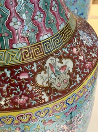 A pair of large Chinese famille rose turquoise-ground 'lotus scroll' vases, Guangxu mark and of the period