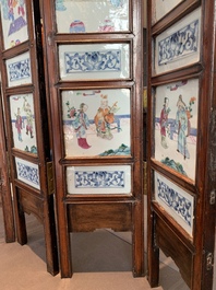 A Chinese four-part folding screen with famille rose plaques, 19th C.