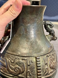 A Chinese silver-inlaid archaistic bronze vase, Da Tang Yuan Nian 大唐元年 mark, 17/18th C.