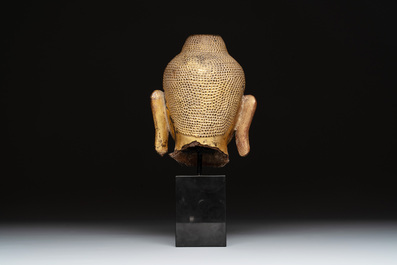 A Burmese gilt-lacquered bronze head of Buddha, 19th C.
