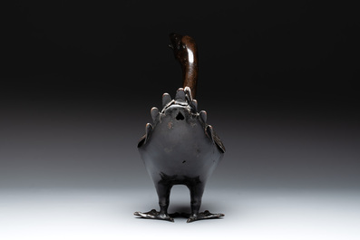A Chinese bronze duck-form incense burner, Ming