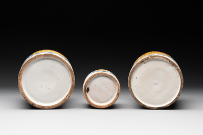 Three rare blue and white Delftware albarelli with painted content medallions and paper shop labels, Northern Europe, 18th C.