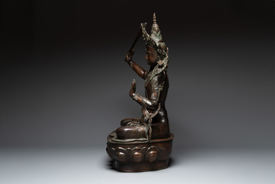 A very large Nepalese bronze sculpture of Manjusri, 19/20th C.